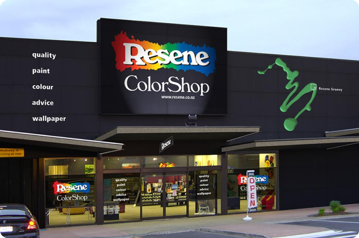 Resene shop front; it is a building with black walls with decor of paint splashes.